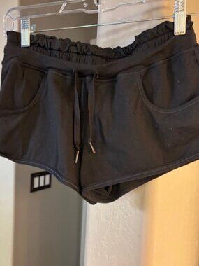 Lululemon Black ultra short running shorts with built in underneath shorts, sz 4